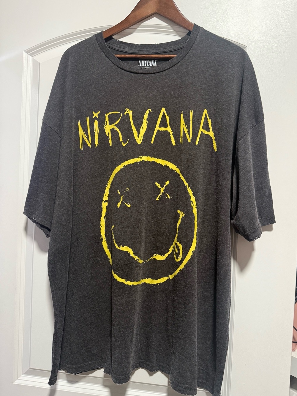 NIRVANA Black Short-Sleeve Tee with Yellow Smiley Logo